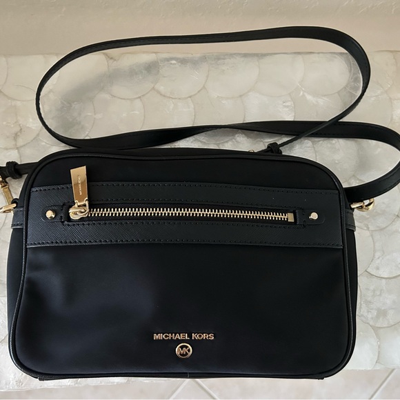 Michael Kors Handbags - NWOT Michael Kors Jet Set Charm Large East West Nylon Crossbody Bag